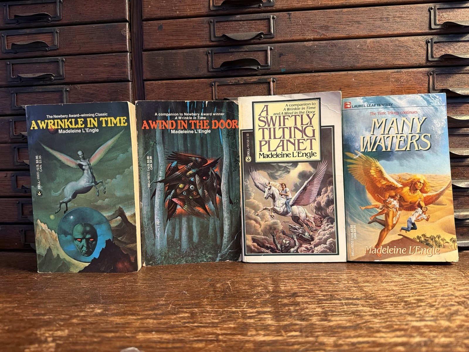 Lot 4: Wrinkle in Time Madeleine L’Engle 1976 Stranger Things Paperback Set Wind